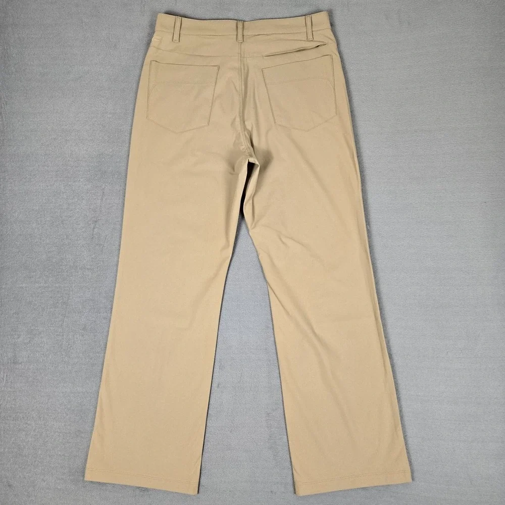 Fabletics Pants Mens 31x32 Beige Kahki The Don 5-Pocket Baggy Fit Chino NWT
